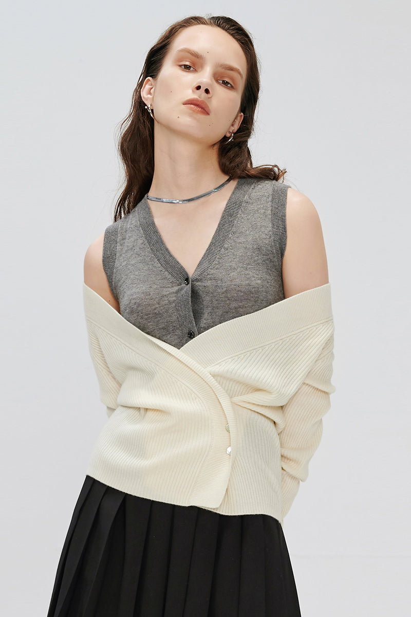 Knitted sweater vest deconstruction style cardigan