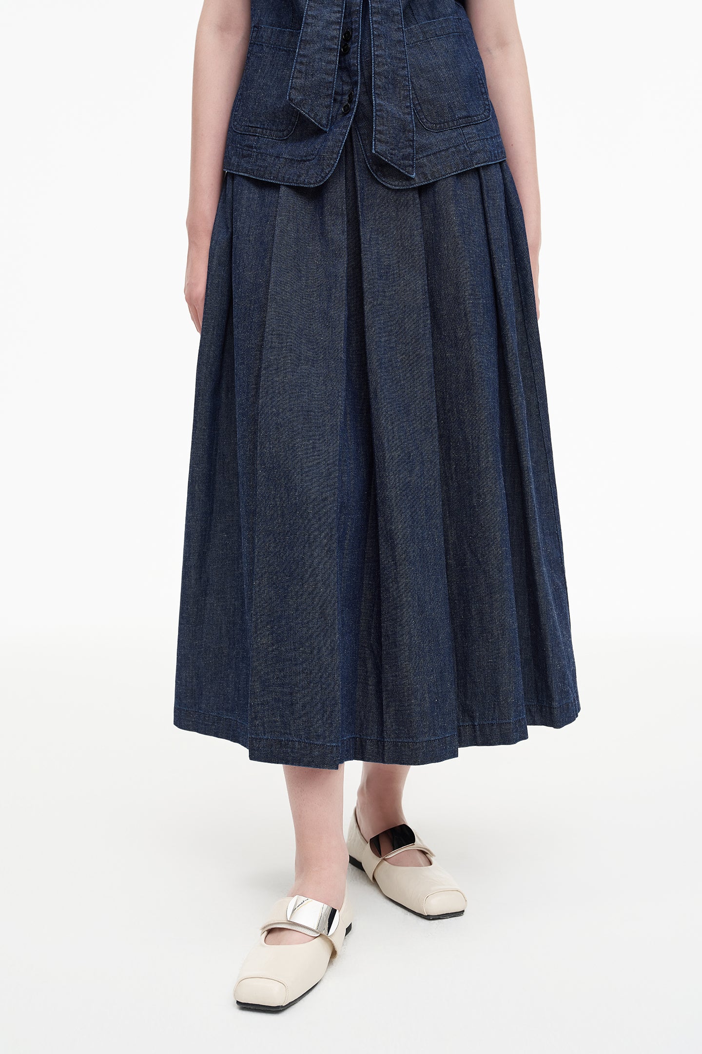 Cotton and linen blend raw cowboy style vest and denim skirt