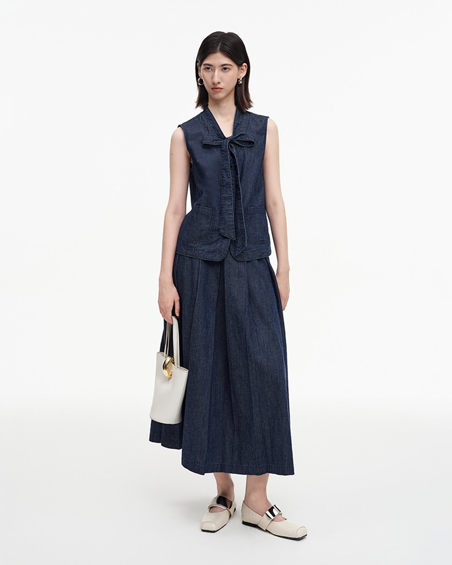 Cotton and linen blend raw cowboy style vest and denim skirt